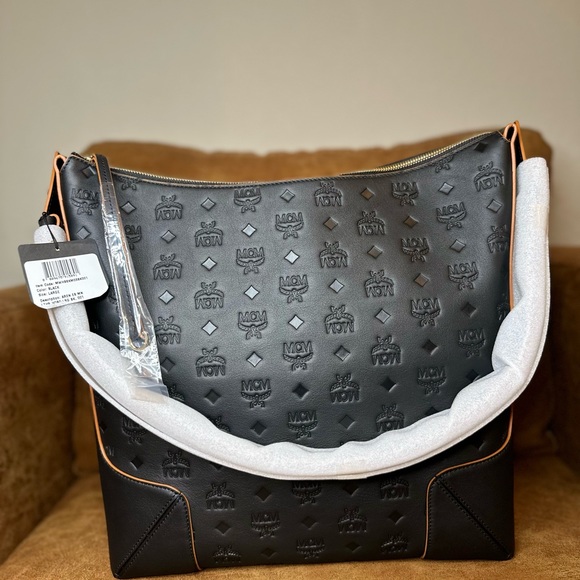 MCM Handbags - MCM Large Aren Hobo Bag in Embossed Monogram Leather